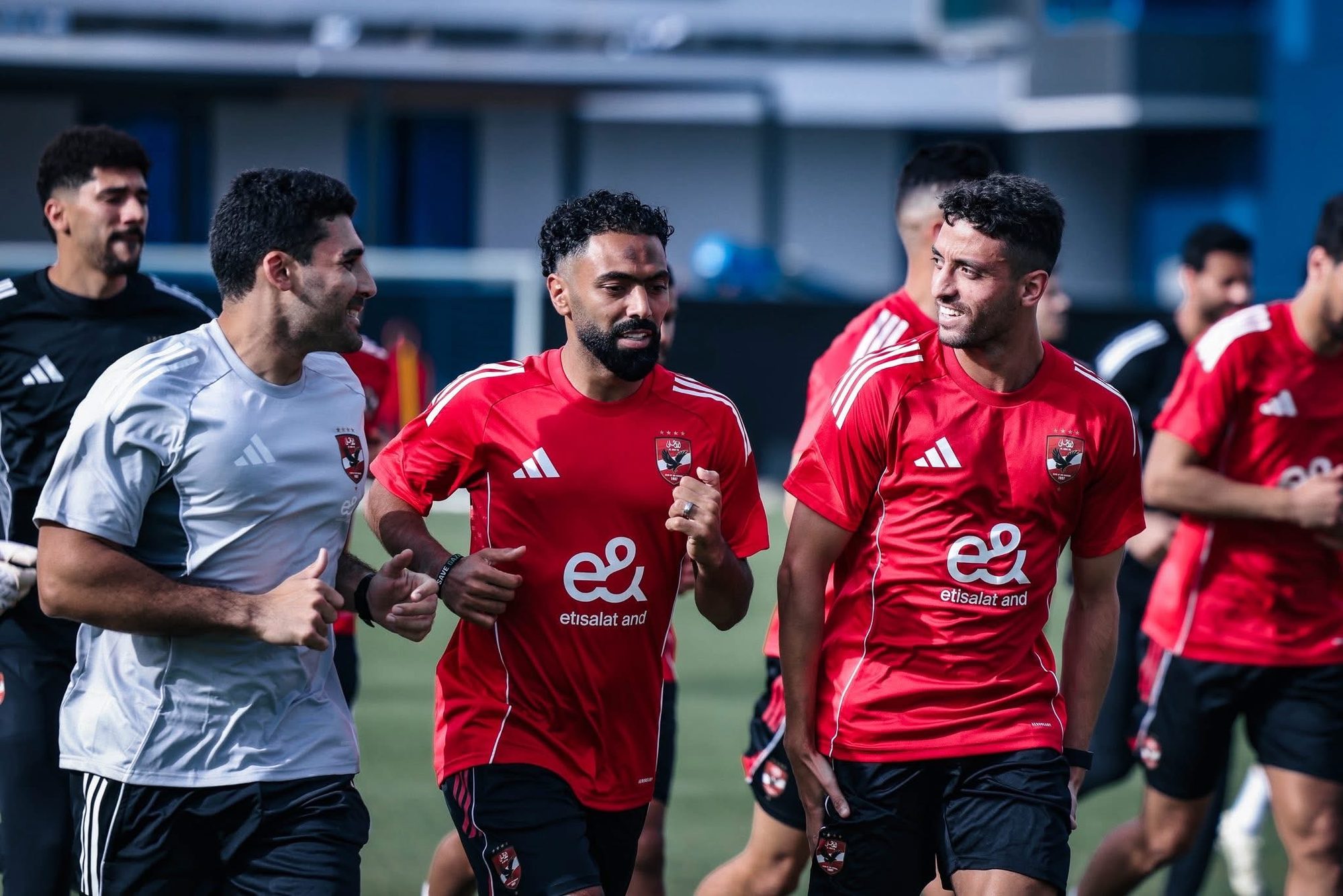 Shihy leading the Al Ahly squad through a running warm-up